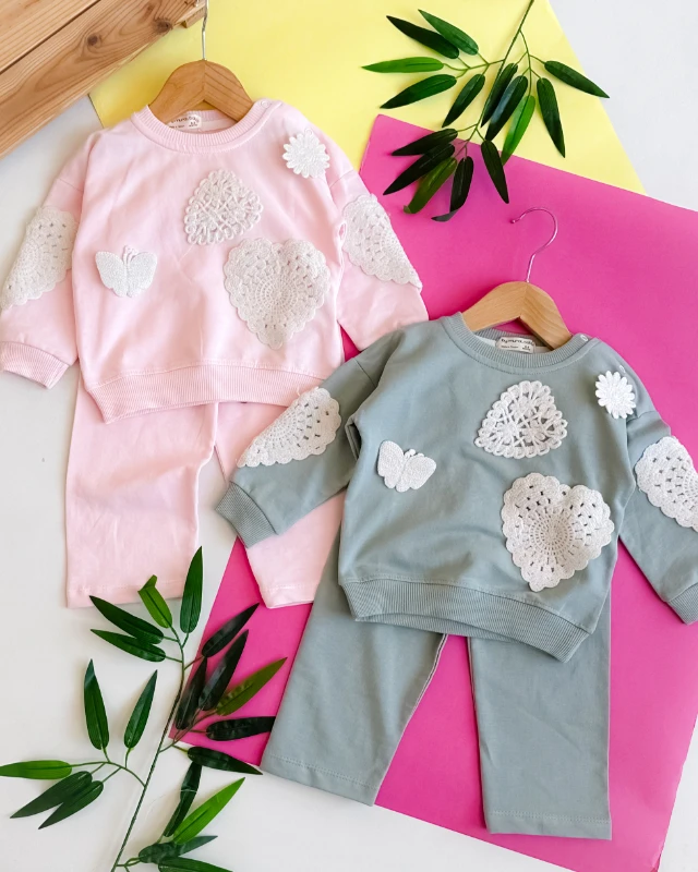 Örgü motifler detaylı omuzdan çıtçıtlı mevsimlik 2li takım 