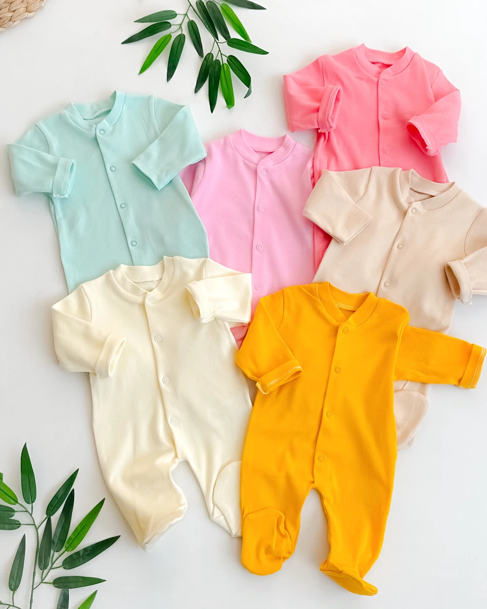 Önden çıtçıtlı ayaklı mevsimlik tulum 