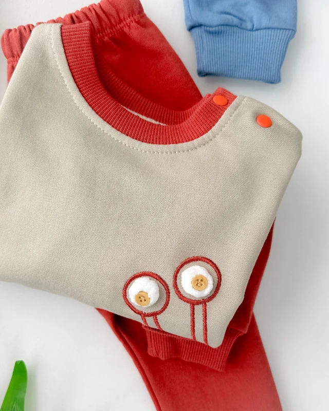 Salyangoz gözler omuzdan çıtçıtlı mevsimlik 2 parça takım