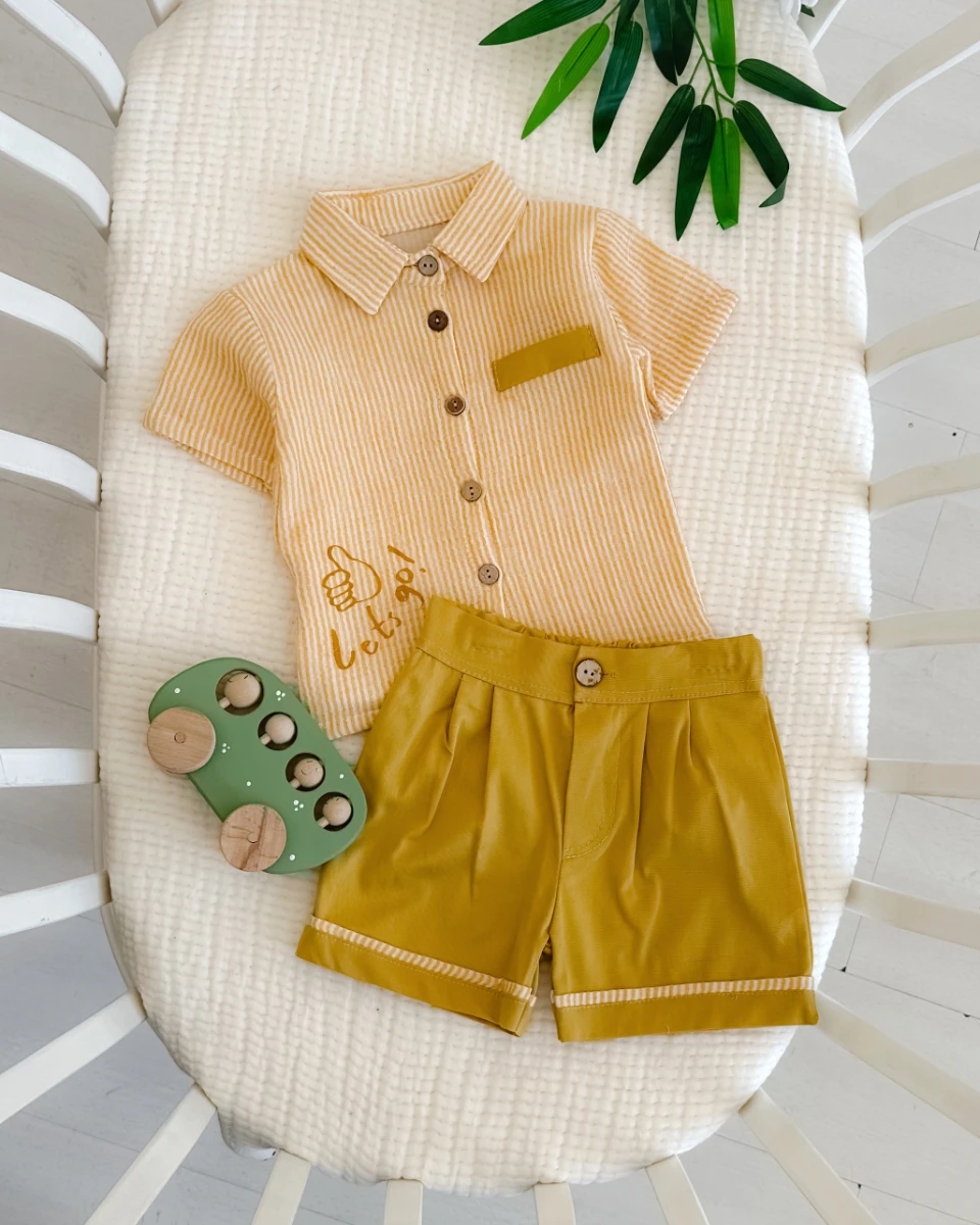 Lets go baskılı cep görünüm detaylı ahşap düğmeli yazlık 2 parça takım